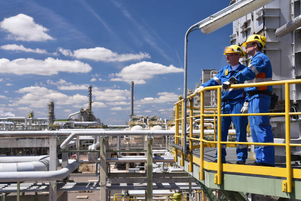 Engineers Inspecting Work at Industry