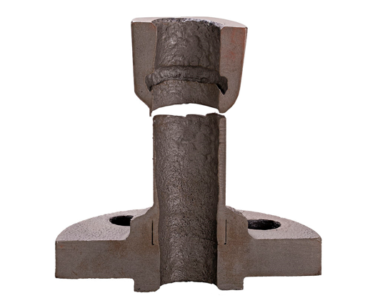 Sulfidation corrosion damage showing iron sulfide formation on steel refinery component