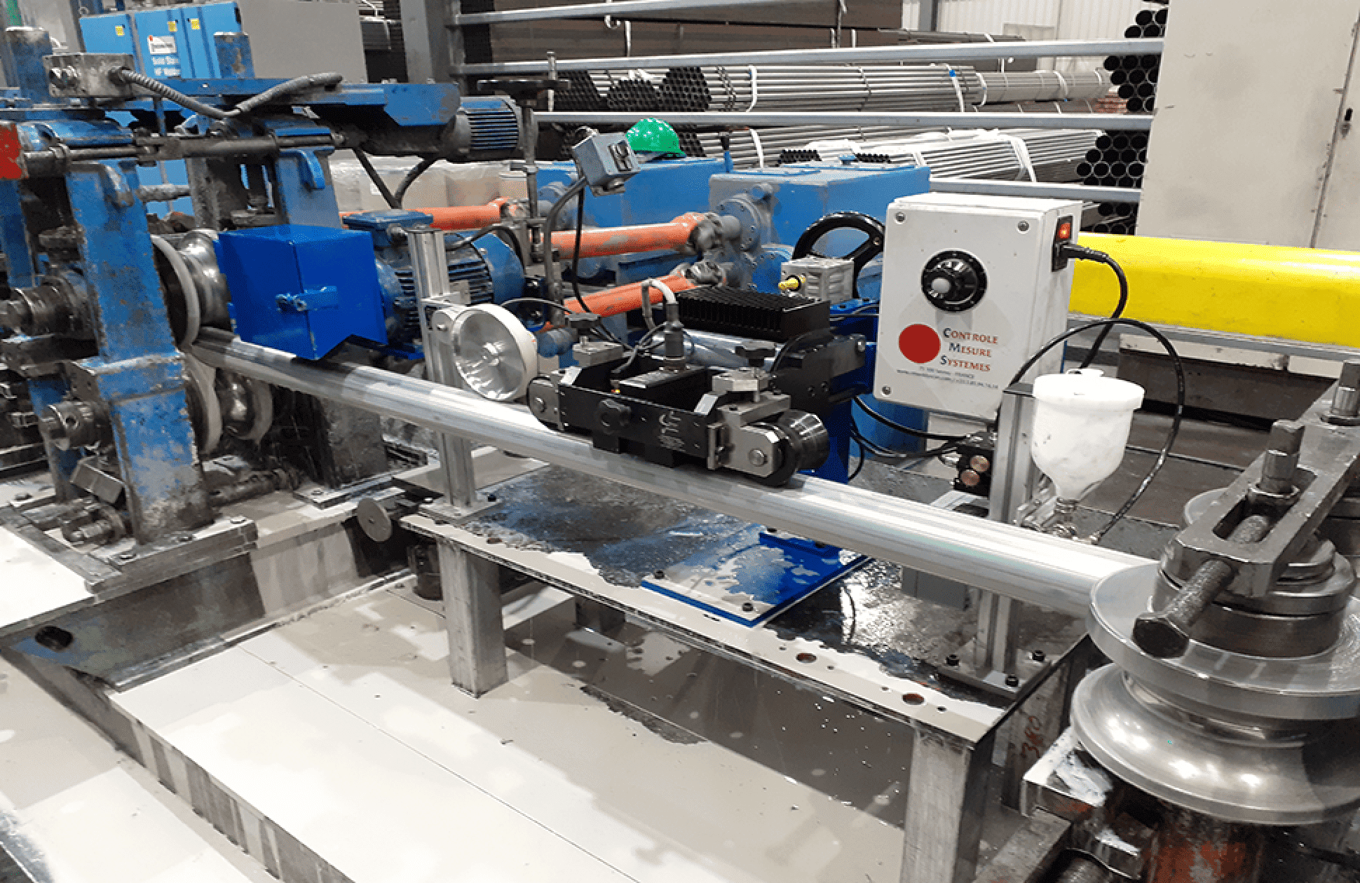 Weld Inspection of ERW Steel Tubes with Sectorial Eddy Current Magnetizing Unit