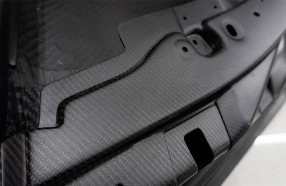 Evaluating CFRP Automotive Parts with Bond Testing: A Cost-Effective NDT Method